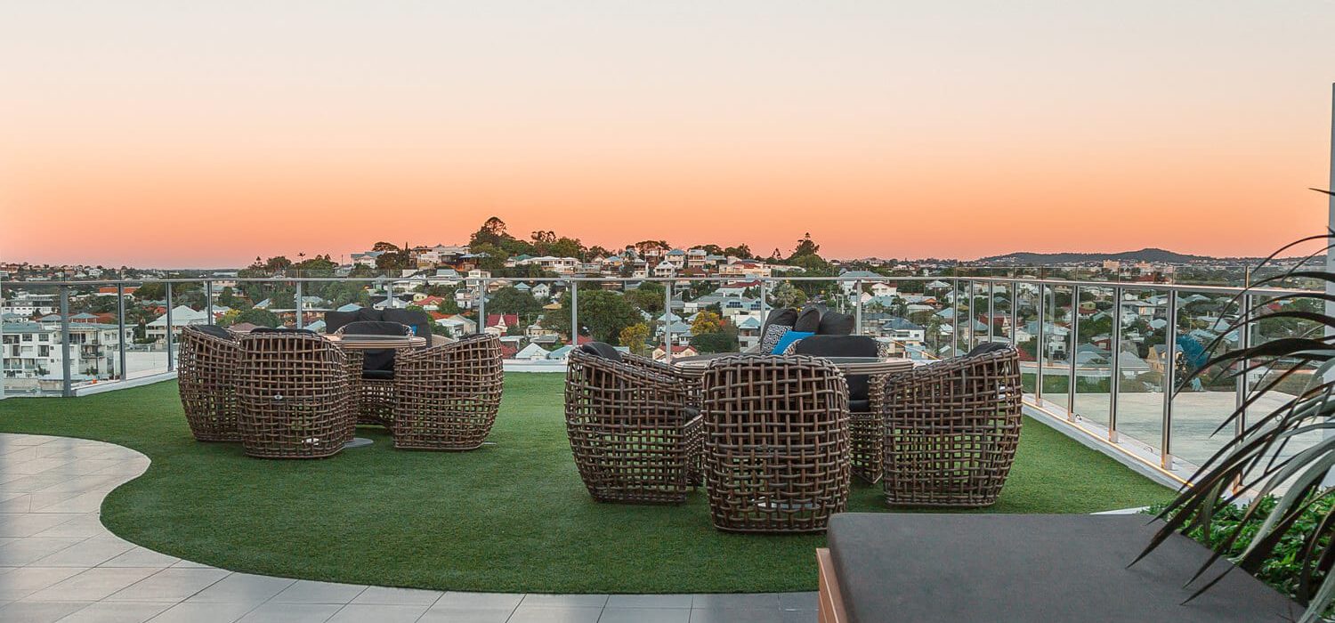 alex-perry hotel and apartments-rooftop-sunset-chairs | Alex Perry Hotel & Apartments