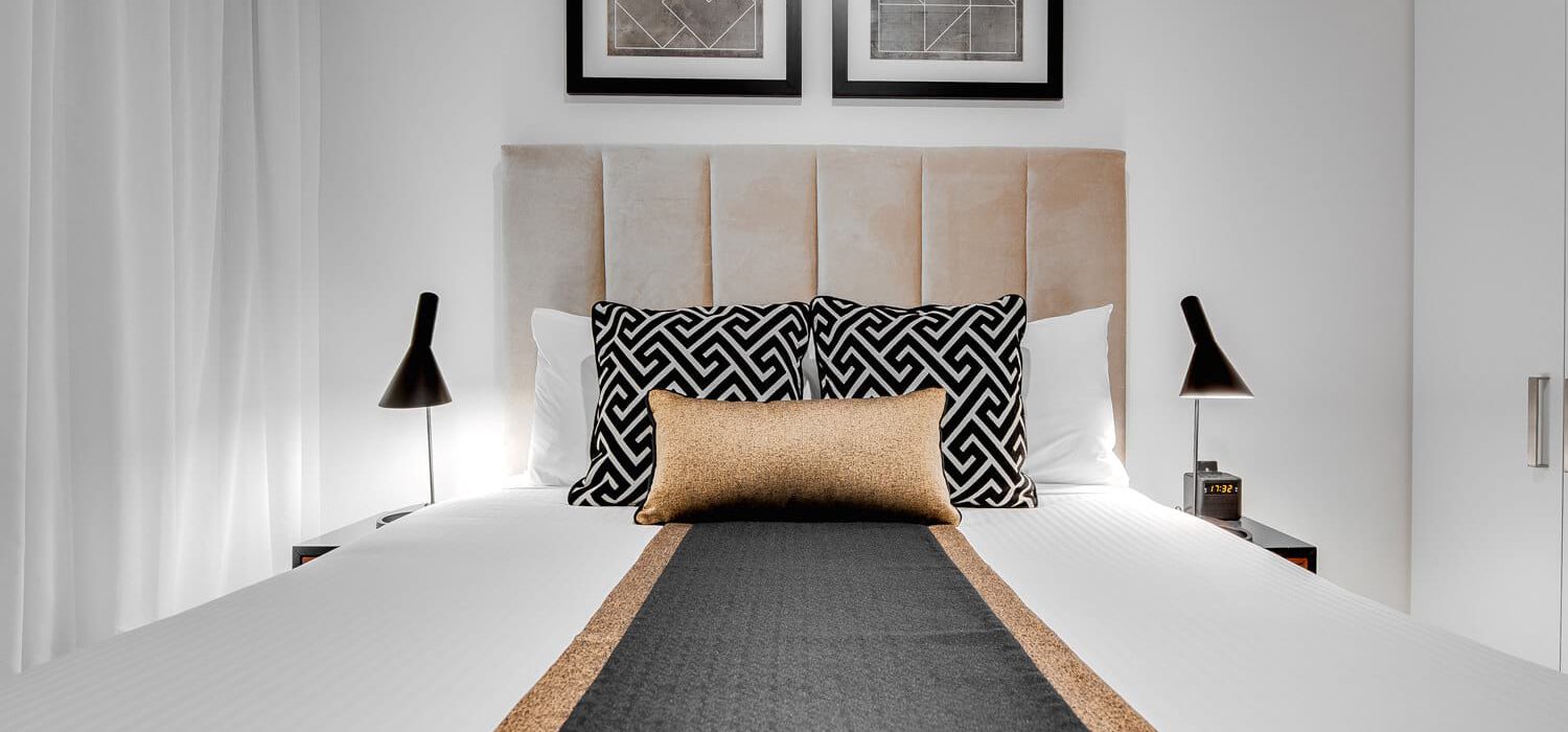 one-bedroom-executive-bed-closeup | Alex Perry Hotel & Apartments